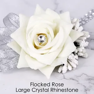 Elegant ivory velvet rose bridal wrist flower with crystal accent and silver ribbon