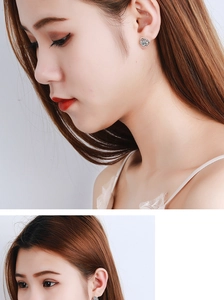 Front and side view of silver flower stud earrings with diamonds on female model