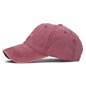 Washed vintage cotton baseball cap in deep pink with white yours letter embroidery