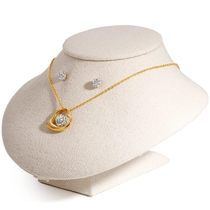 Titanium steel jewelry set with hollow heart pendant and sparkling gemstone earrings