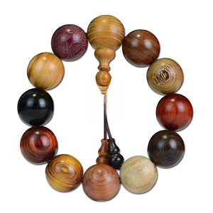 Mixed natural wood bead bracelet featuring multi-colored sandalwood and rosewood beads