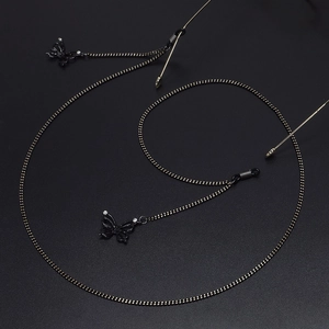 Chaîne de lunettes noire minimaliste avec élégants pendentifs papillon et strass