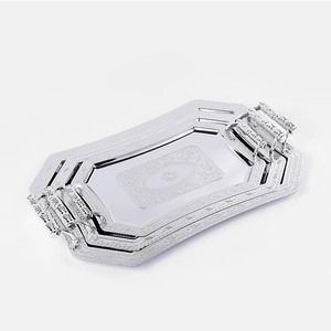 Set of 3 silver rectangular stainless steel trays with ornate handles and carvings