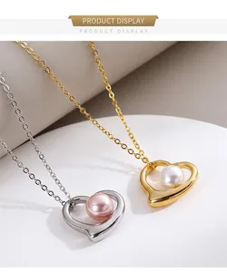 Macro detail of gold and silver heart necklaces with inlaid pearls on a minimalist background