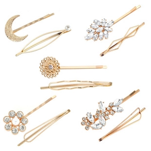 Set of 9 golden metal hair clips with rhinestones, pearls and geometric shapes