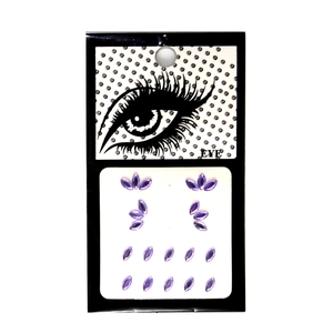 Detail of purple marquise acrylic face jewels set on decorative eye pattern backing card