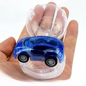 Blue transparent pull-back toy car inside a clear round 32mm plastic gashapon capsule shell