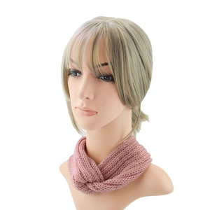 Detail of twisted knit headband in dusty rose pink with soft ribbed wool texture