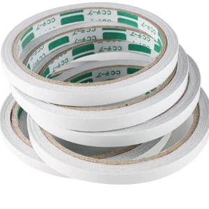 Stack of 12m double-sided adhesive tape rolls with white core and CCT-7 green inner ring