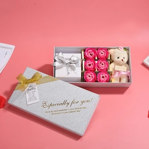 Detail of pink soap flower gift set including a plush bear and small jewelry box