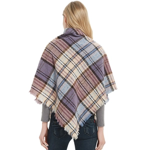 Plaid triangle scarf with purple blue checks and fringe details shown on a model back