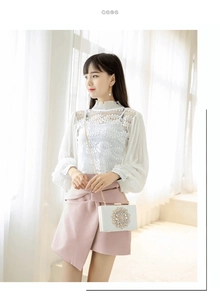Elegant white evening clutch bag with sparkling diamond flower and gold chain strap