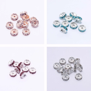 Detailed view of crystal rondelle spacer beads in rose gold and silver finish color variants