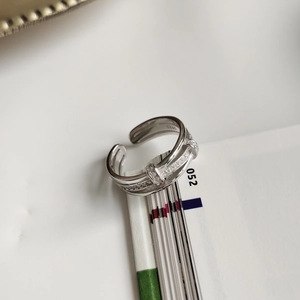 Detailed close-up of S925 sterling silver ring featuring a micro-pave zircon buckle design