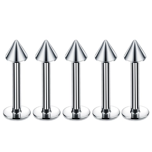 Detail of five silver stainless steel labret studs with flat base and cone tips
