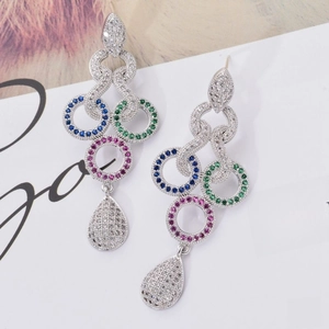 Silver drop earrings with colorful zircon tassels and elegant pear-shaped pendants