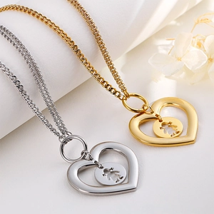 Titanium steel hollow heart necklace set with female charm in gold and silver finish