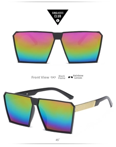 Close-up of oversized black frame sunglasses with rainbow gradient lenses and gold temple detail