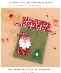 Detail of Christmas drawstring linen gift bag with 3D Santa Claus and tree ornaments