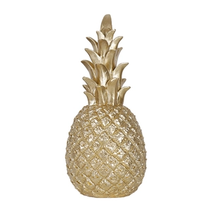 Modern Nordic golden pineapple ornament for living room decor with a shiny metallic finish