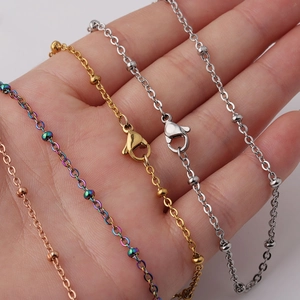 Stainless steel bead chain necklaces in rose gold, rainbow, gold, and silver finishes