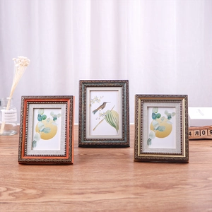 Vintage European style photo frames with baroque embossed details and metallic finishes
