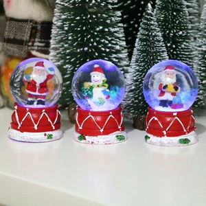 Luminous Christmas crystal balls with Santa Claus and Snowman on red base, set of 3