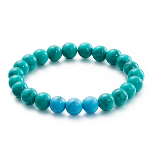 Vintage turquoise beaded stretch bracelet with natural brown veins on a white background