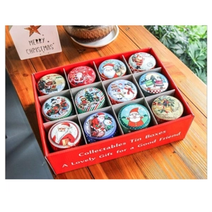 Christmas tin box set with 12 round festive patterns in a red tiered display gift box
