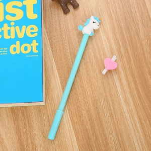 Cute sky blue unicorn gel pen with cartoon 3D figure on a wooden desk setting