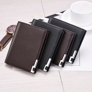 Classic men's bi-fold wallets in lychee grain leather with elegant metal corner accents