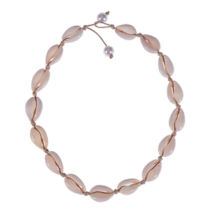 Bohemian choker necklace with natural seashells and white pearls on woven cord