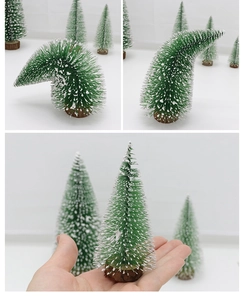 Miniature flexible Christmas tree with snow-dusted needles and a wooden base shown in hand