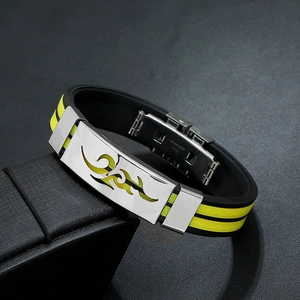 Detail of fire cloud pattern silicone bracelet with stainless steel buckle on leather box