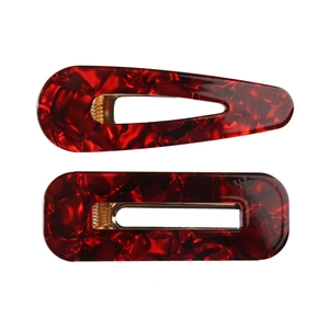 Minimalist red marble acetate hair clip set with teardrop and rectangular gold clips