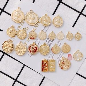 Vintage gold coin charms with Elizabeth II portrait and retro designs for DIY jewelry