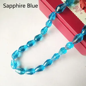 Macro view of royal blue teardrop faceted crystal glass beads for DIY jewelry making
