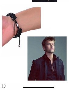 Detail of double-layer tiger eye and lava stone bracelet with adjustable black braided cord