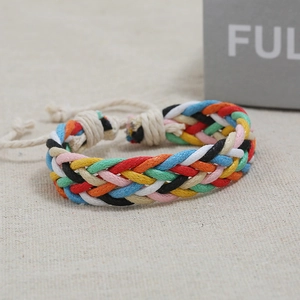 Detail of colorful hand-woven braided bracelet with adjustable knot and boho style