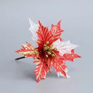 Artificial red and white poinsettia Christmas tree decoration with gold glitter accents