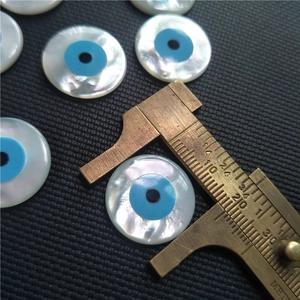 Natural white mother of pearl evil eye beads with 20mm diameter measured by brass caliper