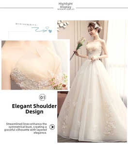 Exquisite champagne wedding dress detail showing layered pleats and butterfly embroidery
