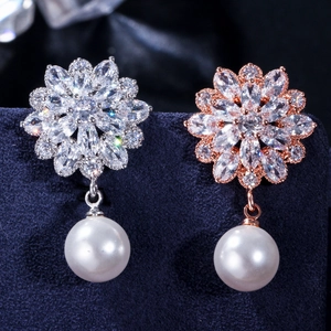 Elegant floral bridal earrings with marquise cubic zirconia and dangling white pearls