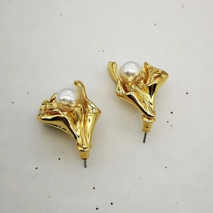 Artistic gold flower pearl earrings with 18K plating and irregular pleated metal design