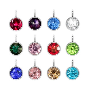 Detailed macro view of 12-color round alloy pendants with embedded colorful gemstones