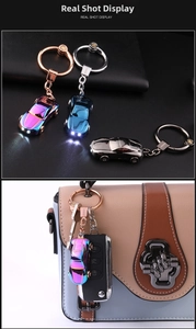 Metal car-shaped keychain with integrated LED light and colorful gradient finish