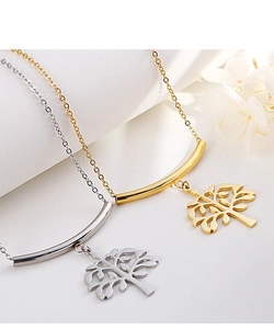Detailed view of Tree of Life pendant necklaces in gold and silver with polished finish