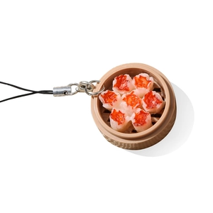 Realistic mini Shumai dumpling in steamer keychain with black cord and metal hook