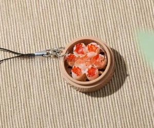 Detailed view of realistic resin dim sum miniatures inside a tiny brown steamer basket