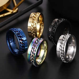 Macro shot of rotatable Cuban chain rings with Roman numerals in five metallic colors